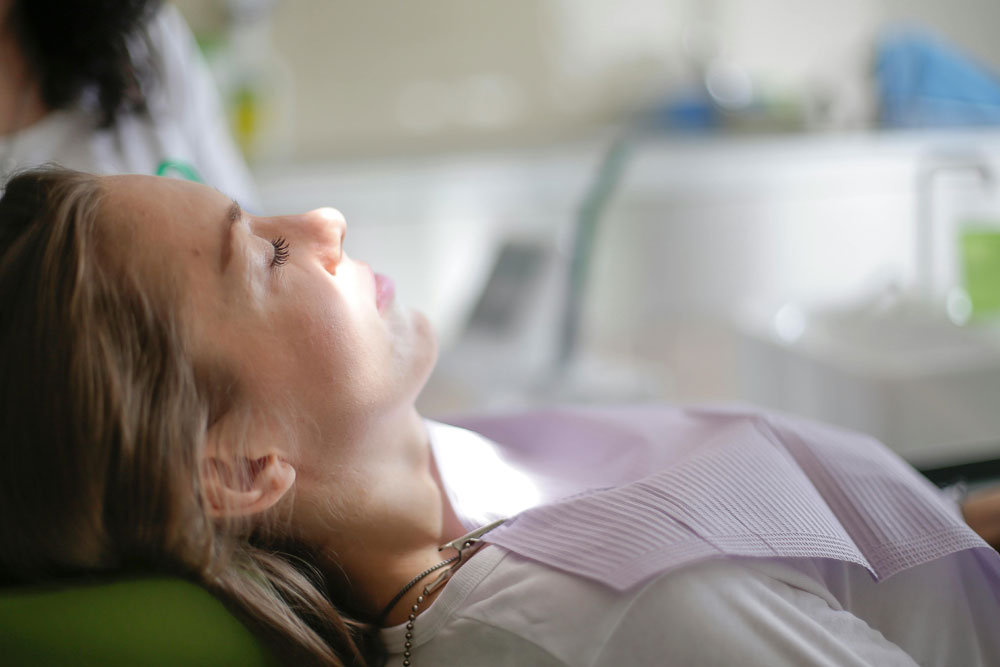 Lady receiving dental treatment