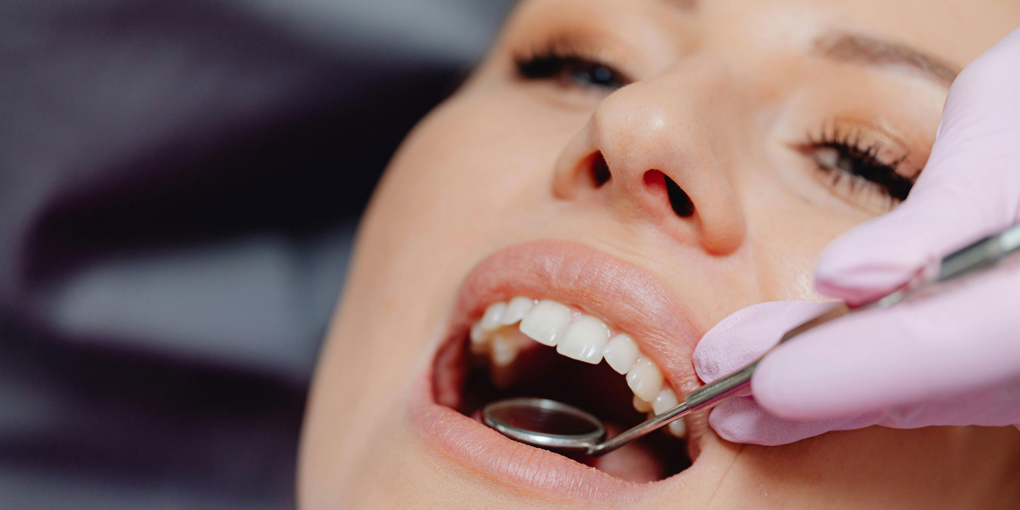 Someone having a checkup at the dentist