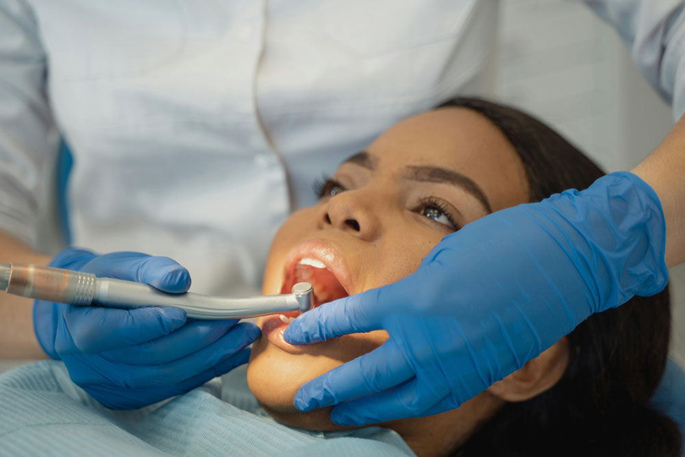 A lady receiving dental treatment